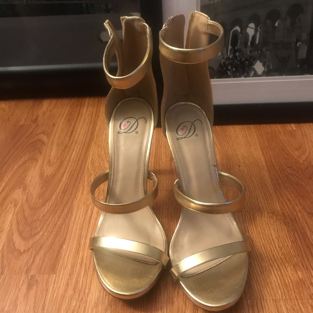 Barely worn gold strapped heels